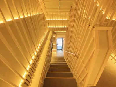 a staircase in a building with lights on it at KEYHOTEL-5minutes for walk to Akihabara Electric Town in Tokyo