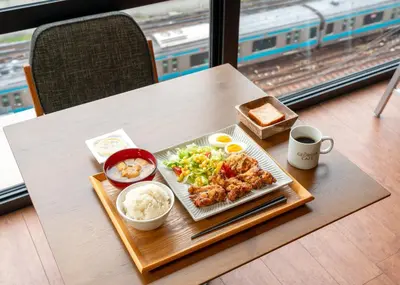 a tray of food on a table with a plate of food at Tabist TOKYO CITY VIEW HOTEL in Tokyo
