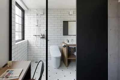 a bathroom with a toilet and a sink at HOTEL CEN in Tokyo