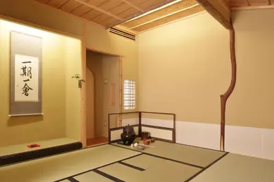 a room with a room with a table and a room with a wall at The Edo Sakura in Tokyo