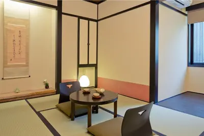 a dining room with a table and chairs at The Edo Sakura in Tokyo