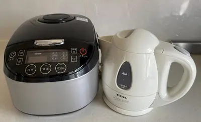 a toaster and a coffee pot sitting on a counter at Skytree House In Tokyo in Tokyo