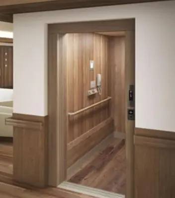 a revolving door in a hotel room with a bed at Asakusa HomeSuites Tokyo in Tokyo