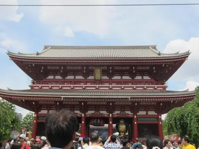 a crowd of people standing in front of a pagoda at Asakusa HomeSuites Tokyo in Tokyo