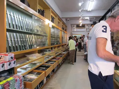 a man standing in a store looking at the shelves at Asakusa HomeSuites Tokyo in Tokyo