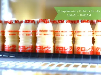 a row of bottles of milk on a shelf at Onyado Nono Asakusa Natural Hot Spring in Tokyo