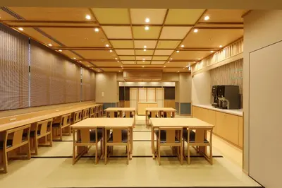 a classroom with tables and chairs in a building at Onyado Nono Asakusa Natural Hot Spring in Tokyo