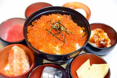a group of small bowls of food on a table at Onyado Nono Asakusa Natural Hot Spring in Tokyo