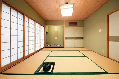 an empty room with a table in the middle at Ryokan ASAKUSA-chaka- by Tranova in Tokyo