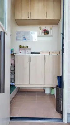 a kitchen with white cabinets and a tile floor at First sight hut house in Tokyo