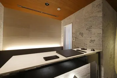 a desk in a room with a wall at KIN HOTEL in Tokyo