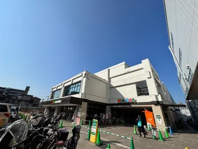 a building with bikes parked in front of it at H2O Stay Ikebukuro in Tokyo