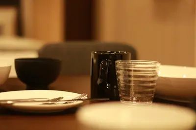 a glass of water sitting on top of a table at Sakura Stay Yoga 301 in Tokyo