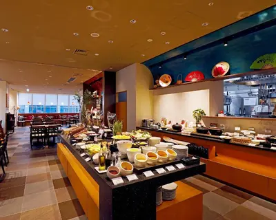 a buffet in a restaurant with a lot of food at remm plus Ginza in Tokyo