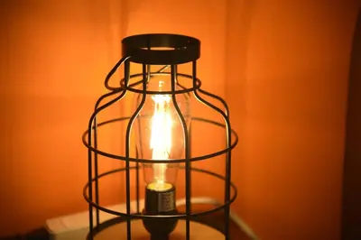 a light in a cage with a candle in it at Roppongi Azabu Sunshine Resort House in Tokyo