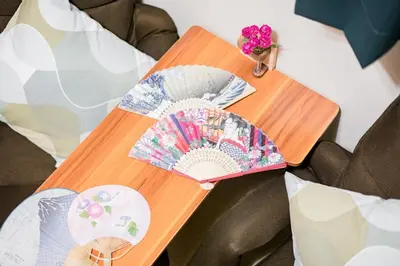 a wooden table with two umbrellas on it at Bunkyo-ku - Apartment / Vacation STAY 4147 in Tokyo