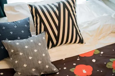 a group of pillows sitting on a couch at Bunkyo-ku - Apartment / Vacation STAY 4147 in Tokyo