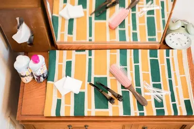 a wooden dresser with two boxes and utensils on it at Bunkyo-ku - Apartment / Vacation STAY 4147 in Tokyo