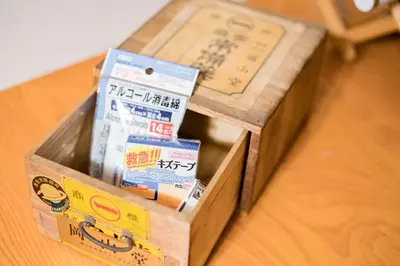 two boxes sitting on top of a wooden table at Bunkyo-ku - Apartment / Vacation STAY 4147 in Tokyo