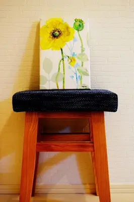 a table with a vase on top of it at Three Tokyo 102 in Tokyo