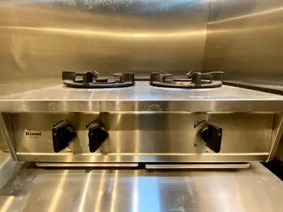 a stove top oven with two burners on it at Shibuya Center Mansion#2DK in Tokyo