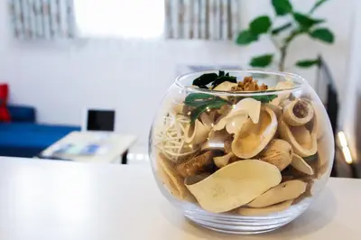 a glass vase filled with food on a table at Alo BnB 5 - Near NIPPORI, SENDAGI, YANAKA GINZA, UENO - Self check-in in Tokyo