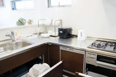 a kitchen with a sink and a counter top at Alo BnB 5 - Near NIPPORI, SENDAGI, YANAKA GINZA, UENO - Self check-in in Tokyo