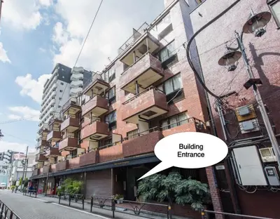 an image of a building with a building entrance at Shibuya Lions Mansion#1DK in Tokyo