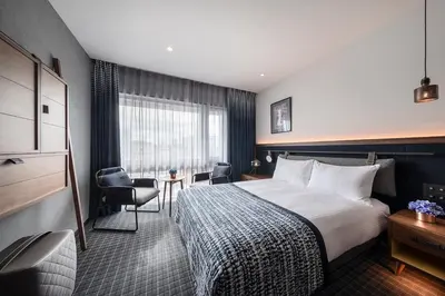 a hotel room with a bed and a desk at THE LIVELY TOKYO AZABUJUBAN in Tokyo