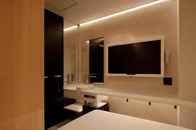a bathroom with a sink and a large mirror at hotel min \u5927\u4eba\u5c02\u7528 in Tokyo