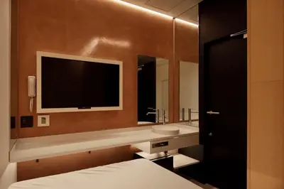 a bathroom with a sink and a large mirror at hotel min \u5927\u4eba\u5c02\u7528 in Tokyo