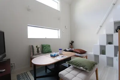 a living room with a table and a couch at Building A101 / Vacation STAY 1277 in Tokyo