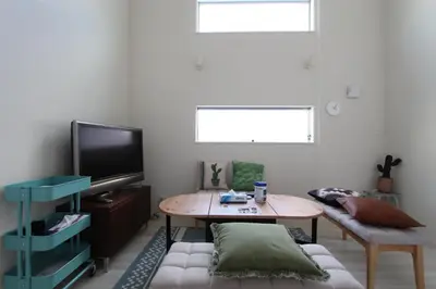 a living room with a coffee table and a tv at Building A101 / Vacation STAY 1277 in Tokyo