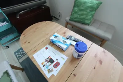 a wooden coffee table with a remote control on it at Building A101 / Vacation STAY 1277 in Tokyo