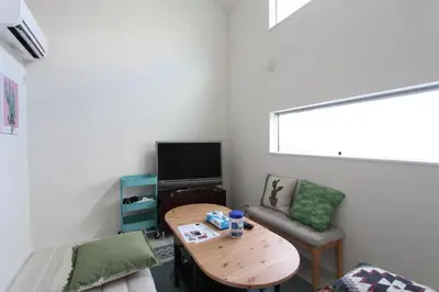a small living room with a table and a tv at Building A101 / Vacation STAY 1277 in Tokyo