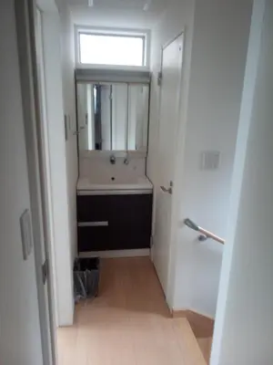 a bathroom with a sink and a window at Private room in new House in Tokyo