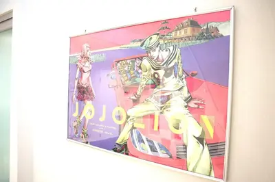a painting of a man on a sign on a wall at Building A101 / Vacation STAY 1275 in Tokyo