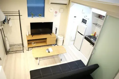 an overhead view of a small living room with a refrigerator at Building A101 / Vacation STAY 1275 in Tokyo