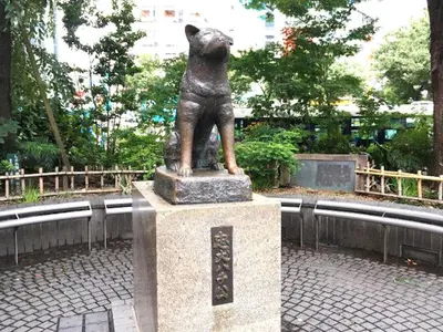a statue of a dog standing on a pedestal at Building A101 / Vacation STAY 1276 in Tokyo