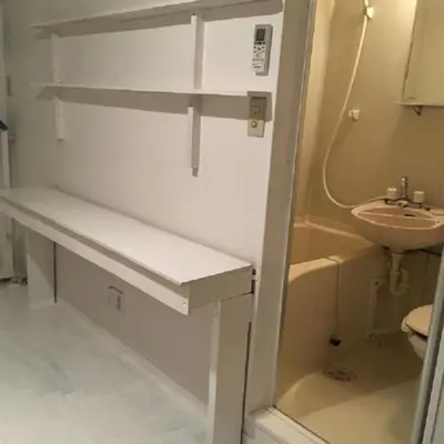 a small bathroom with a sink and a toilet at minimalist\u7d4c\u5802\u306e\u5c0f\u3055\u306a\u304a\u90e8\u5c4b in Tokyo