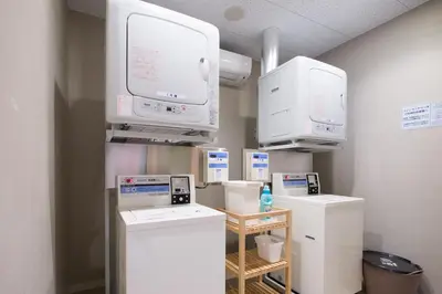 a hospital room with machines and a tv at Super Hotel Tokyo JR Shinkoiwa in Tokyo