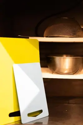 a white object on a shelf in a kitchen at SATELLITE HOTEL Yoyogi Sangubashi \u30b5\u30c6\u30e9\u30a4\u30c8\u30db\u30c6\u30eb\u4ee3\u3005\u6728\u53c2\u5bae\u6a4b in Tokyo