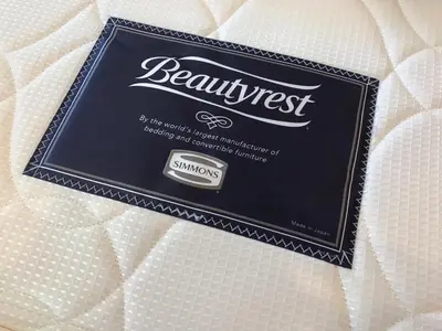 a box of beehiest soap sitting on a bed at Tokyo Sakurako Hatchobori in Tokyo