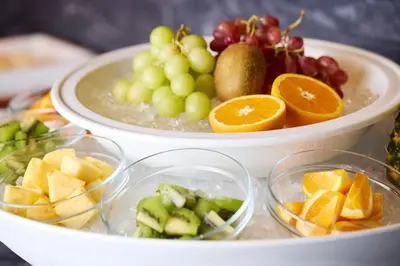 two bowls of fruit on top of a table at Villa Fontaine Grand Tokyo Shiodome in Tokyo