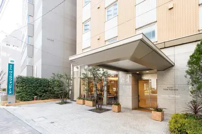 a lobby of a building with an awning on it at Villa Fontaine Tokyo Hamamatsucho in Tokyo