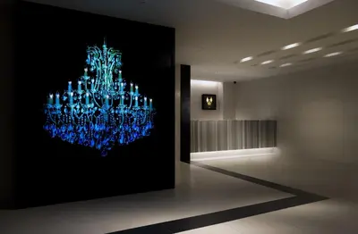 a painting of a blue chandelier in a room at Villa Fontaine Tokyo Shinjuku in Tokyo