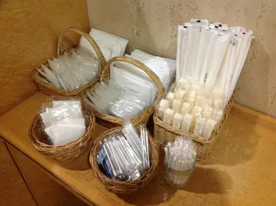 three baskets sitting on a counter with at Smile Hotel Nihombashi Mitsukoshimae in Tokyo