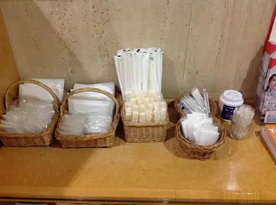 a shelf with three baskets of eggs and medicines at Smile Hotel Nihombashi Mitsukoshimae in Tokyo