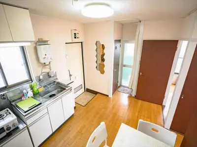 a kitchen with a sink and a counter top at Murata Corpo 301 in Tokyo