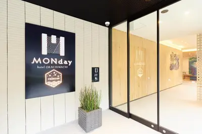 a sign on the side of a building at hotel MONday Premium Ueno Okachimachi in Tokyo